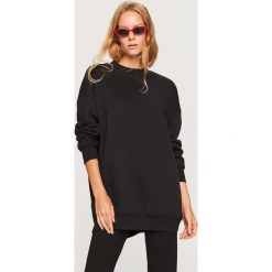 Długa bluza - Czarny. Bluzy damskie marki KALENJI. W wyprzedaży za 69.99 zł.