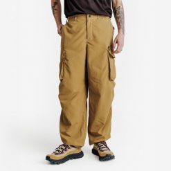 Spodnie Cargo unisex Vertigo 76. Brązowe spodnie materiałowe męskie Decathlon, l, bez wzorów, z bawełny, retro. Za 179.99 zł.