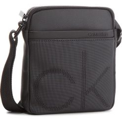 Saszetka CALVIN KLEIN - Ck Piont Mini Report K50K503868 001. Saszetki męskie marki Calvin Klein. W wyprzedaży za 259.00 zł.
