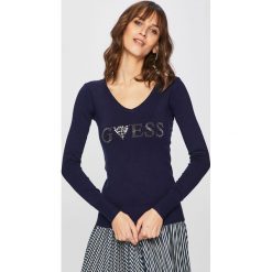 Guess Jeans - Sweter. Niebieskie swetry damskie Guess Jeans, xs, z aplikacjami, z dzianiny, bez kołnierzyka, bez ramiączek, krótkie, bez kaptura. W wyprzedaży za 199.90 zł.