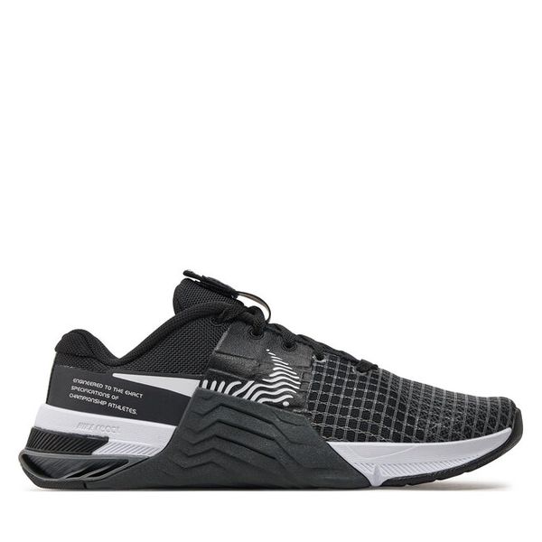 Buty na siłownię Nike. Czarne obuwie sportowe damskie Nike, bez wzorów, na fitness i siłownię. Za 499.99 zł.