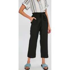 Answear - Spodnie. Żółte legginsy damskie ANSWEAR, l, bez wzorów, z poliesteru. W wyprzedaży za 39.90 zł.