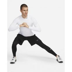 Legginsy sportowe męskie Nike. Czarne legginsy sportowe męskie Nike, m, bez wzorów, z dresówki. W wyprzedaży za 153.40 zł.