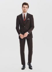 PAKO LORENTE - Brązowy garnitur męski. Brązowe garnitury męskie Pako Lorente, bez wzorów, z poliesteru, biznesowe. Za 1,999.98 zł.