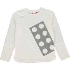 Koszulka "Thomas 604" w kolorze kremowym. Białe t-shirty dla chłopców marki LEGO Wear, z materiału, z długim rękawem. W wyprzedaży za 59.95 zł.