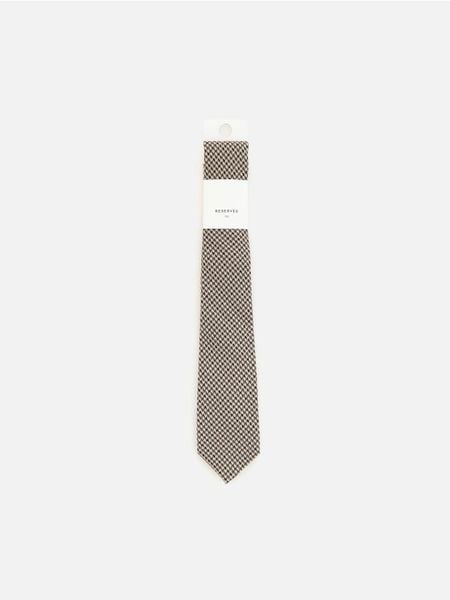 Krawat w pepitkę - wielobarwny. Krawaty i muchy Reserved, bez wzorów. Za 59.99 zł.