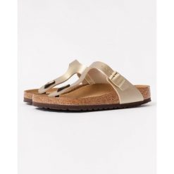 Japonki damskie Birkenstock Gizeh. Żółte klapki damskie Birkenstock, bez wzorów, z materiału, sportowe, bez obcasa. Za 416.30 zł.