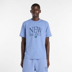Koszulka męska New Balance MT61X6EQAA3 – niebieska. Niebieskie koszulki sportowe męskie New Balance, m, bez wzorów, z bawełny, bez kołnierzyka, bez ramiączek. Za 139.99 zł.
