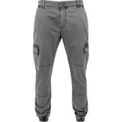Spodnie Urban Classics cargo z kantem. Czarne spodnie sportowe męskie Urban Classics, bez wzorów, z materiału, do biegania. Za 200.00 zł.