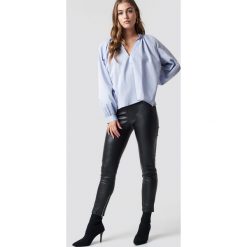 NA-KD Trend Spodnie z suwakiem PU - Black. Spodnie materiałowe damskie marki NA-KD Trend. Za 161.95 zł.
