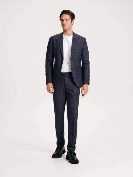 Marynarka slim fit w kratę - granatowy. Niebieskie marynarki męskie Reserved, bez wzorów, z tkaniny. Za 329.99 zł.