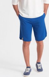Ombre Szorty męskie dresowe z zaokrągloną nogawką - niebieskie V1 OM-SRSK-0105 S. Niebieskie krótkie spodenki sportowe męskie Ombre, m, bez wzorów, z dresówki. Za 39.99 zł.