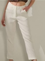 Klasyczne spodnie z wiskozą - kremowy. Białe spodnie materiałowe damskie Sinsay, l, bez wzorów, z wiskozy. Za 49.99 zł.