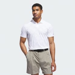 Koszulka polo Ultimate365 Tour Nylon. Białe koszulki sportowe męskie Adidas, m, bez wzorów, z nylonu, bez kołnierzyka, bez ramiączek, na golfa. W wyprzedaży za 219.45 zł.