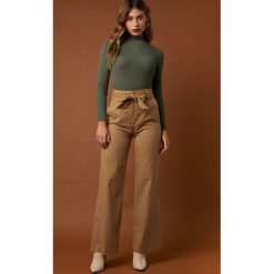 NA-KD Trend Szerokie spodnie z wywijanymi nogawkami - Beige. Spodnie materiałowe damskie marki NA-KD Trend. Za 202.95 zł.