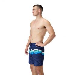 SPEEDO SZORTY MĘSKIE STRIPE FLEX BRDSHRT 18" NAVY 8-00484501529 D6 T36. Niebieskie krótkie spodenki sportowe męskie Speedo, m, bez wzorów, żeglarskie. Za 274.39 zł.