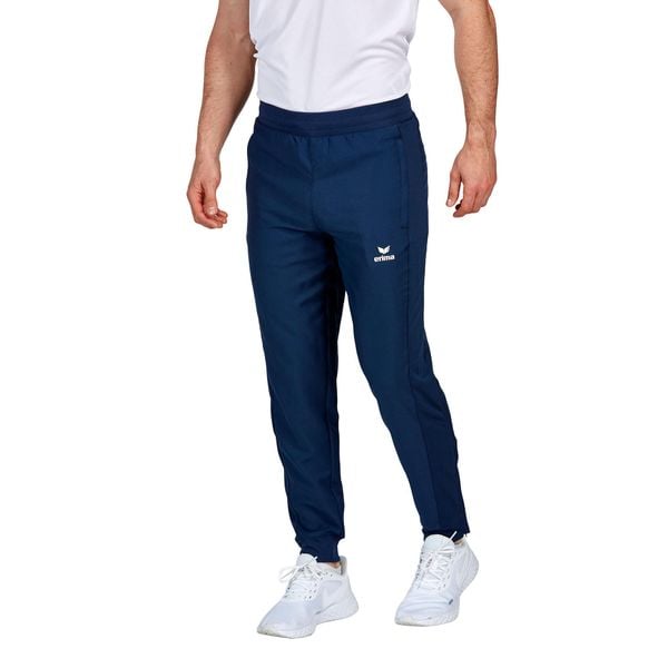 Spodnie do biegania Erima Change. Niebieskie krótkie spodenki sportowe męskie Erima, bez wzorów, do biegania. Za 208.50 zł.