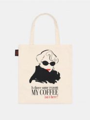 Materiałowa torba shopper z nadrukiem Diabeł ubiera się u Prady - kremowy. Białe torebki shopper damskie Sinsay, bez wzorów, z materiału, z nadrukiem, bez dodatków. Za 15.99 zł.