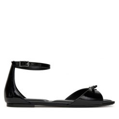 Sandały DKNY. Czarne sandały damskie DKNY, bez wzorów, bez obcasa, na płaskiej podeszwie, bez zapięcia. Za 299.99 zł.