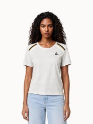 Koszulka damska Le Coq Sportif Heritage. Brązowe t-shirty damskie le coq sportif, xl, z aplikacjami, z bawełny, klasyczne, bez kołnierzyka. Za 216.50 zł.