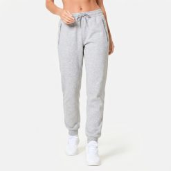 Spodnie dresowe fitness damskie Domyos slim. Szare spodnie dresowe damskie DOMYOS, l, bez wzorów, z dresówki, na fitness i siłownię. Za 99.99 zł.