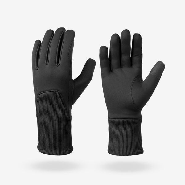 Rękawiczki jeździeckie dla dzieci 100 ciepłe. Czarne rękawiczki dziecięce FOUGANZA, bez wzorów, z materiału. Za 39.99 zł.