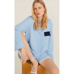 Mango - Koszula Nicole. Niebieskie bluzki damskie Mango, l, bez wzorów, z bawełny, klasyczne, bez kołnierzyka, bez ramiączek. W wyprzedaży za 79.90 zł.