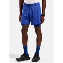 Spodenki męskie Odlo 2-in-1 short ZEROWEIGHT 5 INCH. Niebieskie krótkie spodenki sportowe męskie Odlo, m, bez wzorów, z tkaniny, do biegania. Za 349.99 zł.