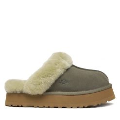 Kapcie Ugg. Zielone kapcie damskie UGG, bez wzorów. Za 549.99 zł.