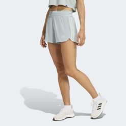 Spodenki fitness damskie ADIDAS 3S Pacer. Niebieskie szorty sportowe damskie Adidas, m, bez wzorów, ze skóry, klasyczne, z podwyższonym stanem, na fitness i siłownię, climacool (adidas). Za 159.99 zł.