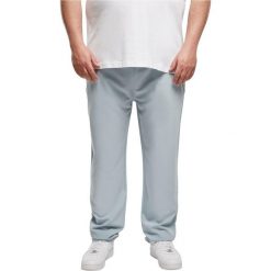 Spodnie do biegania Urban Classics Tapered. Niebieskie krótkie spodenki sportowe męskie Urban Classics, m, bez wzorów, z dresówki, do biegania. Za 243.50 zł.