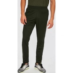 Under Armour - Spodnie Sportstle Pique Track. Szare spodnie sportowe męskie Under Armour, z materiału. W wyprzedaży za 139.90 zł.
