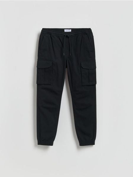 Spodnie jogger cargo - czarny. Czarne spodnie materiałowe męskie Reserved, l, bez wzorów, z bawełny. Za 149.99 zł.
