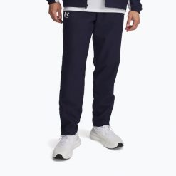Spodnie męskie Under Armour Rival Woven Windbreaker Pant. Niebieskie buty sportowe męskie Under Armour, m, bez wzorów, na fitness i siłownię. Za 169.99 zł.
