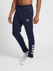Spodnie dresowe z poliestru Hummel Core XK. Niebieskie spodnie dresowe damskie Hummel, s, bez wzorów, z dresówki. Za 175.95 zł.