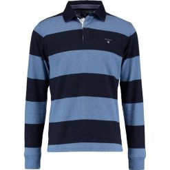 GANT THE ORIGINAL BARSTRIPE HEAVY RUGGER Koszulka polo denim blue melange. Bluzki z długim rękawem męskie GANT, z bawełny, z długim rękawem. Za 419.00 zł.