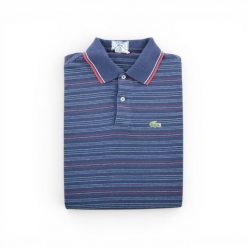 Second life - Koszulka polo męska Izod - Stan bardzo dobry. Niebieskie koszulki polo męskie Lacoste, l, bez wzorów, z materiału, bez kołnierzyka, bez ramiączek, tenisowe. Za 127.76 zł.