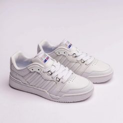 Buty sportowe damskie K-Swiss SI-18 Rival skórzane sneakersy białe (98531-101-M). Białe obuwie sportowe damskie K-SWISS, bez wzorów, na fitness i siłownię. Za 259.00 zł.