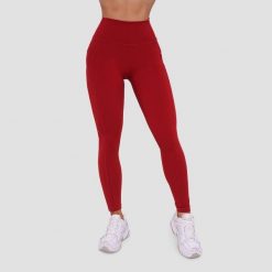 Legginsy damskie fitness z kieszeniami ciemnoczerwone Ignite. Czerwone legginsy damskie GYMBEAM, m, bez wzorów, z elastanu. Za 115.90 zł.