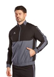 Kurtka prezentacyjna Erima Six Wings. Czarne kurtki męskie Erima, xl, bez wzorów, z materiału, sportowe, bez kaptura. Za 255.00 zł.
