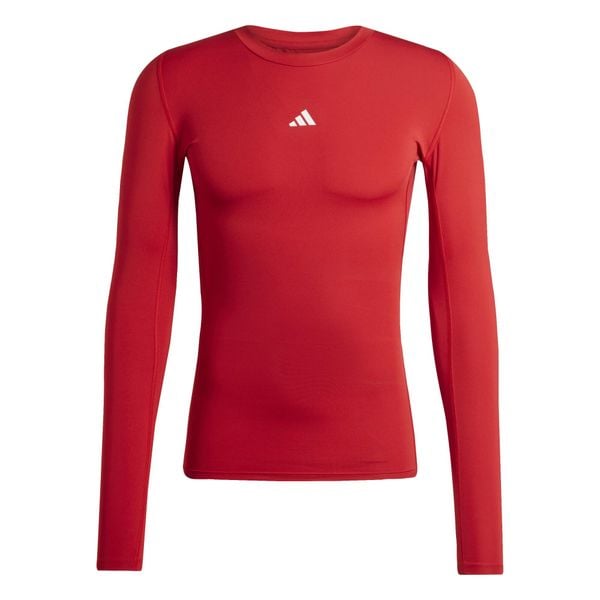 Koszulka męska adidas Techfit Long Sleeve Tee. Czerwone koszulki sportowe męskie Adidas, m, bez wzorów, z elastanu, bez kołnierzyka, bez ramiączek, na fitness i siłownię, techfit (adidas). Za 115.99 zł.