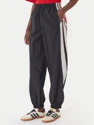 Adidas Spodnie dresowe Sport Santiago KC9116 Czarny Loose Fit. Czarne spodnie dresowe damskie Adidas, s, bez wzorów, z dresówki. Za 349.99 zł.