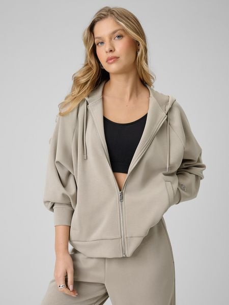 4F Bluza dresowa regular z modalem damska - beżowa XL. Brązowe bluzy damskie 4f, s, bez wzorów, z dresówki, z kapturem. W wyprzedaży za 179.99 zł.