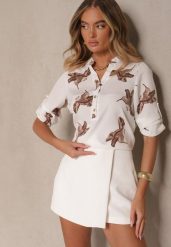 Biała Koszula z Bawełną ze Wzorem Ptaków Lumevire. Białe bluzki damskie Renee, l, z aplikacjami, z bawełny, eleganckie, bez kołnierzyka, bez ramiączek. Za 54.99 zł.