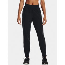 Spodnie sportowe damskie Under Armour UA OutRun the Storm. Czarne spodnie dresowe damskie Under Armour, m, bez wzorów, z dresówki, do biegania. Za 249.99 zł.