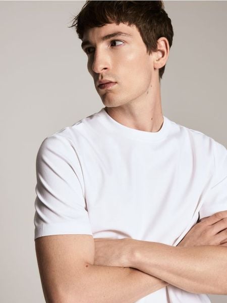 T-shirt regular z bawełny pima - biały. Białe t-shirty męskie Reserved, l, bez wzorów, z bawełny, bez kołnierzyka. Za 99.99 zł.