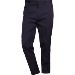 LibertineLibertine TRANSWORLD Spodnie materiałowe navy. Spodnie materiałowe męskie Libertine-Libertine, z bawełny. Za 569.00 zł.