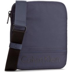 Saszetka CALVIN KLEIN - Matthew Flat Crossov K50K502881 422. Saszetki męskie marki Calvin Klein. W wyprzedaży za 219.00 zł.