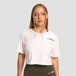 Koszulka damska fitness cropped bawełniana Limitless biała. Białe koszulki sportowe damskie GYMBEAM, s, bez wzorów, z bawełny, klasyczne, bez kołnierzyka. Za 76.90 zł.