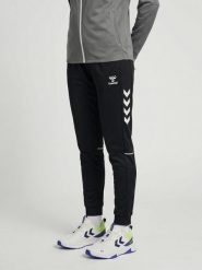 Damskie spodnie dresowe Hummel Core 2.0 Track. Białe spodnie sportowe damskie Hummel, xs, bez wzorów, z dresówki, na fitness i siłownię. Za 246.00 zł.